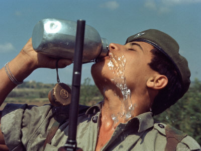 Israeli Soldier Drinking from Canteen
