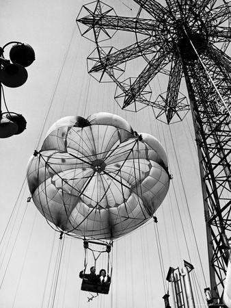 Couple Taking a Ride on the 300 Ft. Parachute Jump at Coney Island Amusement Park