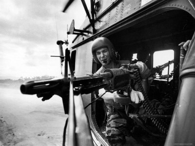 Helicopter Crew Chief James Farley Using M-60 Machine Gun in Landing Zone Near Da Nang