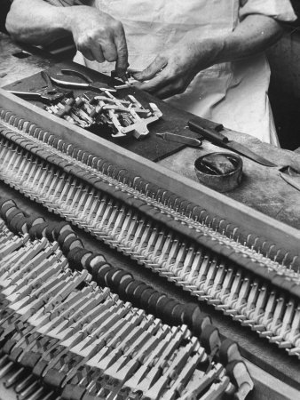 Workman Installing Some of the Whippens, Shanks and Hammers at the Steinway Piano Factory