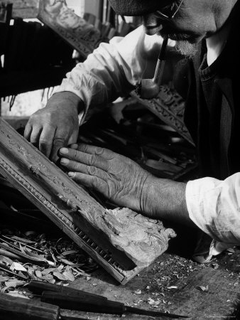 Frame Maker "Petit Pierre" Smoking His Pipe, Works in His Studio in Montmartre Section of Paris
