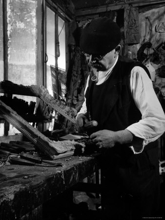 Frame Maker "Petit Pierre" Smoking His Pipe, Works in His Studio in Montmartre Section of Paris