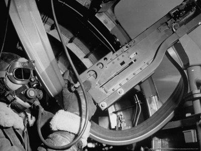 Waist Gunner Robert G. Nichols Manning His 50 Cal. Machine Gun in the American B-17 "Little Bill"