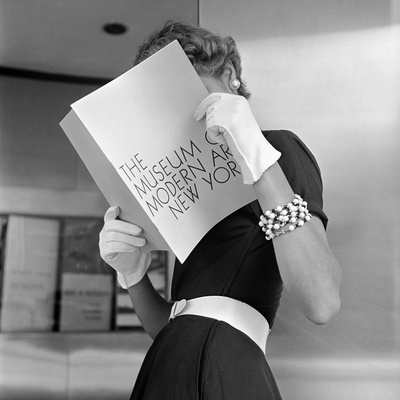 Model Jean Patchett Modeling Cheap White Touches That Set Off Expensive Black Dress