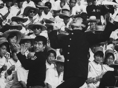 Male Cheerleaders Getting the Crowds Going During Baseball Game Poster