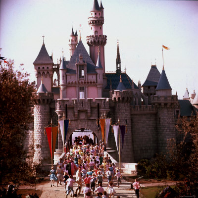 Crowds Walking Through Gate of Sleeping Beauty
