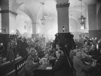 Interior of Munich Beer Hall, People Sitting at Long Tables, Toasting