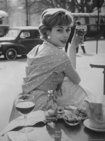 French Fashion Model Marie Helene Arnaud Sitting at a Cafe