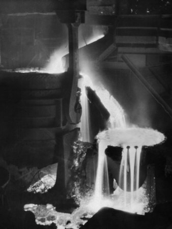 Buy Molten Steel Cascading in Otis Steel Mill in Historic "Pouring the Heat" Photo at AllPosters.com