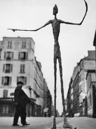 Skeletal Giacometti Sculpture on Parisian Street