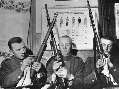 Polish Soldiers Cleaning Their Rifles