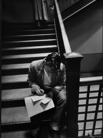 MIT Student Sitting in Stairwell to Fill Out Registration Forms For Second Semester