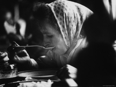 Polish Woman Eating Soup in Restaurant