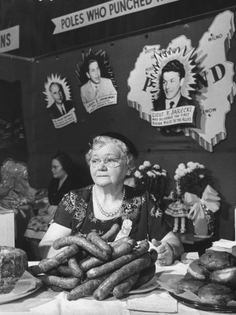 Polish Kielbasa Sausage Piled Among the Various Foods at the Women