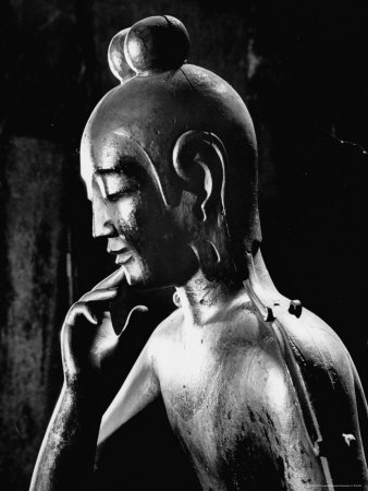 Statue of Kwan Yin, Buddhist Impersonation of Wisdom and Compassion