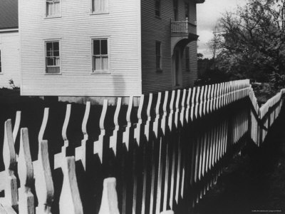 Wooden Picket Fence Surrounding a Building Built in 1850 in a Shaker Community