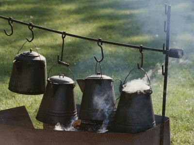 Buy Four Metal Coffee Pots Steaming over an Outdoor Grill at AllPosters.com