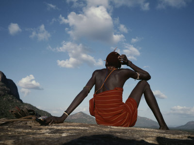 A Samburu Goatherd Takes a Break on the Top of a Hill