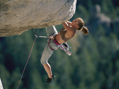 Buy A Female Climber Negotiates an Overhang at AllPosters.com