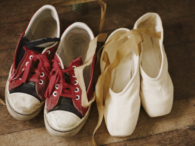 Buy A Pair of Tennis Shoes with Red Laces Sits Next to a Pair of Ballet Slippers at AllPosters.com
