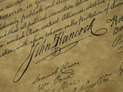 A Close View of John Hancocks Signature on a Reproduction of the Declaration of Independence