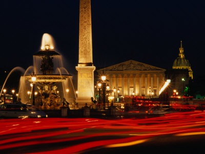 Illuminated Ancient Egyptian Obelisk and Fountain in Place De La Concorde, Paris, France