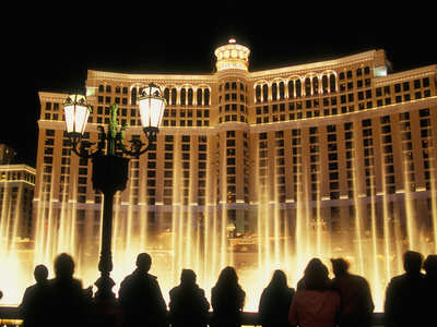 Spectators Watch the Water Fountain Show at the Bellagio Hotel and Casino in Las Vegas, Nevada, USA