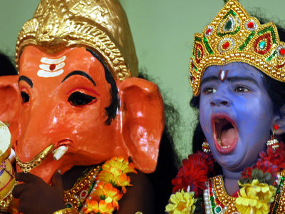 A Child Dressed as Hindu God Krishna Yawns, Chennai, India, September 22, 2006