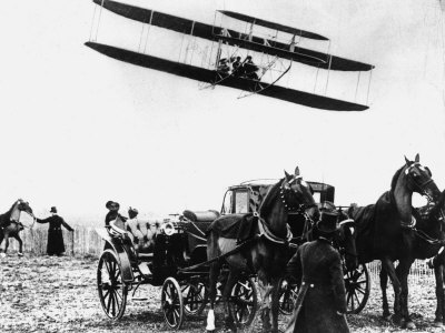 Buy Wilbur Wright with His Plane in Flight at Pau in France, February 1909 at AllPosters.com
