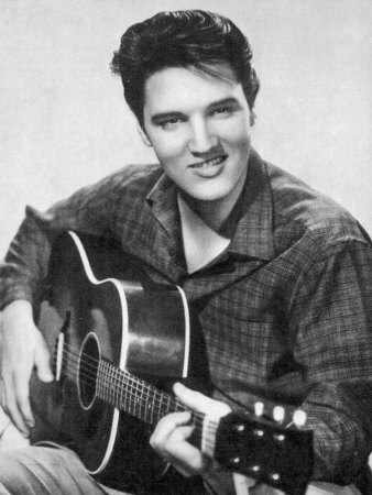 Buy Elvis Presley American Pop Singer Guitarist and Actor in Musical Films Seen Here with His Guitar at AllPosters.com