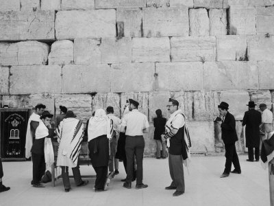 Jewish Men in Various Modes of Traditional Dress at the Wailing Wall in Jerusalem