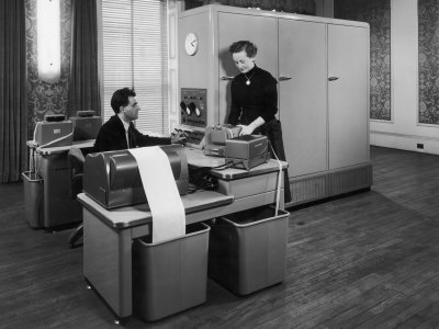 Man and a Women Working Together with a Pegasus Computer