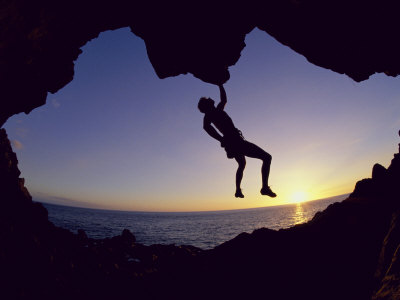 Silhouette of a Man Hanging from a Rock Poster