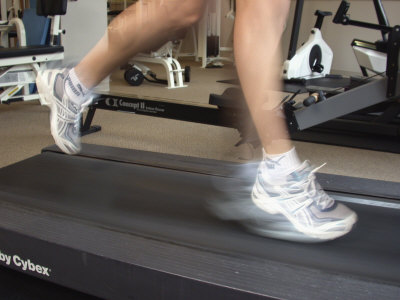 Blurred Image of Legs on a Treadmill