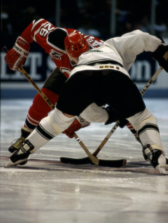 Hockey Players in Head to Head Competition Poster