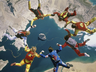 Skydivers in a Circular Formation Poster