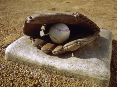 Buy Baseball in a Baseball Glove on a Base at AllPosters.com
