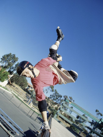 Skateboarder Performing a Handplant on a Ramp Poster