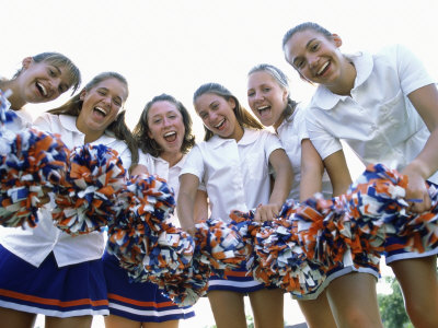 Portrait of a Group of Cheerleaders Holding Pom-Poms Poster