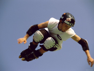 Teenager Inline Skating in Mid-Air Poster