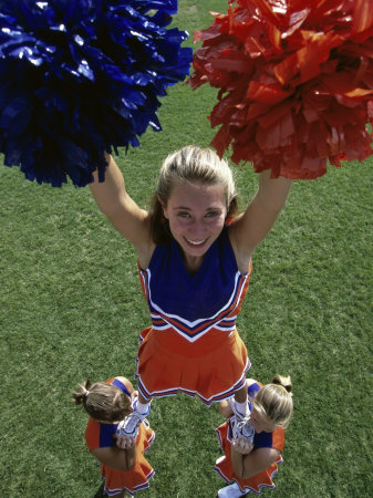 High Angle View of Cheerleaders Performing with Pom-Poms Poster