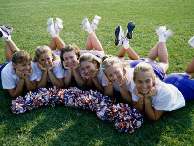 High Angle View of Cheerleaders Lying on a Lawn Poster