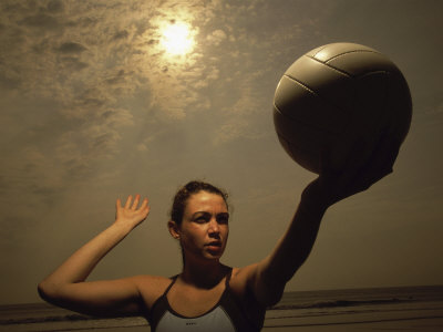 Buy Young Woman Playing Beach Volleyball at AllPosters.com