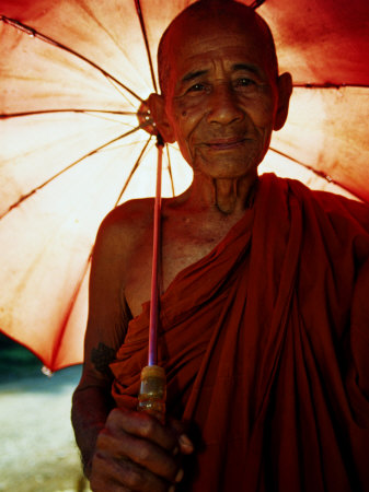 Smiling Monk Holding Umbrella, Mrauk U, Myanmar (Burma)