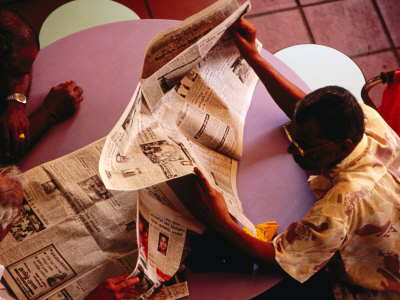 Men Reading Newspaper at Tekka Central Market, Little India, Singapore, Singapore