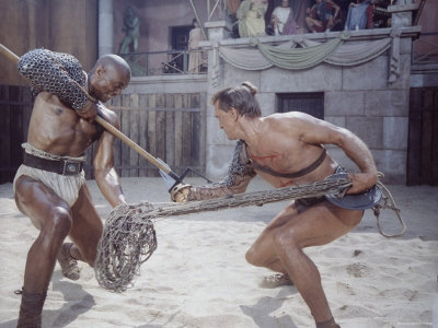 Actor Woody Strode Squaring Off Against Actor Kirk Douglas in Gladiator Battle in "Spartacus"