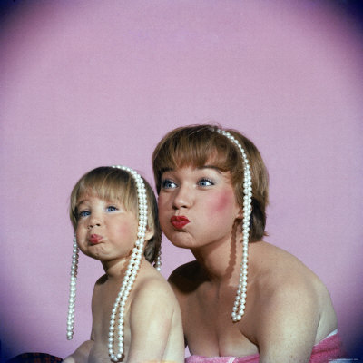Actress Shirley MacLaine and Daughter Sachi Parker Pouting with String of Pearls on Their Heads