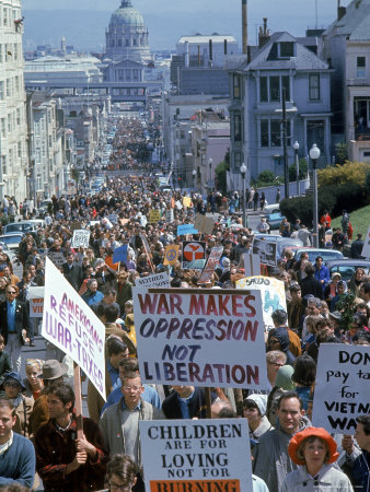 Students Carrying Antiwar Signs While Marching in Protest of US Involvement in the Vietnam War