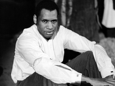 Singer and Actor Paul Robeson Sitting and Resting Arms on Knees. Circa 1940