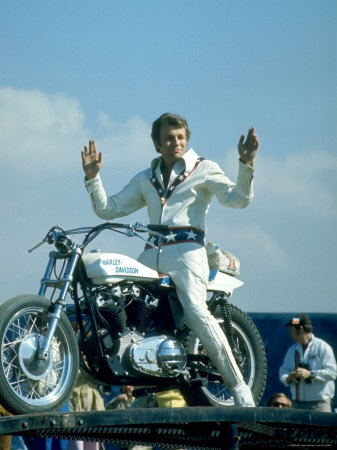 Motorcycle Daredevil Evel Knievel Poised on His Harley Davidson